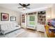 Inviting home office with built-in bookshelves, natural light, and comfortable seating at 38 Malauka Dr, Ocklawaha, FL 32179