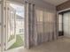 Bedroom leads to a private balcony with artificial turf and seating area at 415 Old Farm Ln, Winter Springs, FL 32708