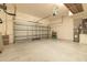 Spacious two-car garage with ample room for storage and parking at 415 Old Farm Ln, Winter Springs, FL 32708