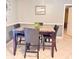 Dining room with a dining table, four chairs and access to the kitchen at 4235 Shades Crest Ln, Sanford, FL 32773