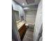 Bathroom features tub with shower, wood-look flooring, and single sink vanity at 4503 Oak Arbor Cir, Orlando, FL 32808