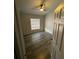 Bedroom with wood look flooring, ceiling fan, and natural light from window at 4503 Oak Arbor Cir, Orlando, FL 32808