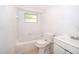 Bathroom with a bath tub, toilet, and sink at 4524 King Cole Blvd, Orlando, FL 32811
