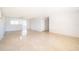 Bright and airy living room with terrazzo flooring, providing a clean and spacious ambiance at 4524 King Cole Blvd, Orlando, FL 32811