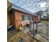 Backyard shot of the house, patio, and surrounding equipment at 4840 Judy Ann Ct, Orlando, FL 32808