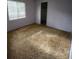 Bedroom with a window and closet, offering a simple and functional space at 4840 Judy Ann Ct, Orlando, FL 32808