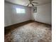 Bedroom featuring carpet floors, a ceiling fan, and a bright window for natural light at 4840 Judy Ann Ct, Orlando, FL 32808
