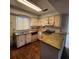 Kitchen featuring neutral cabinetry and laminate countertops at 4840 Judy Ann Ct, Orlando, FL 32808