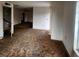 Spacious living room with a large window and neutral walls at 4840 Judy Ann Ct, Orlando, FL 32808
