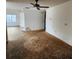 Living room area with a ceiling fan and neutral walls at 4840 Judy Ann Ct, Orlando, FL 32808
