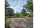 Backyard shot of an in-ground pool surrounded by a concrete pool deck at 4840 Judy Ann Ct, Orlando, FL 32808