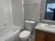 Bathroom with vanity, shower-tub combo, and tile flooring at 514 Wilton Cir, Sanford, FL 32773