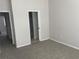 Bedroom with soft carpet flooring, neutral paint, and well-lit space at 514 Wilton Cir, Sanford, FL 32773