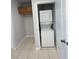 Laundry room with stacked washer and dryer at 514 Wilton Cir, Sanford, FL 32773