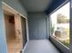 View of outdoor patio with air conditioning units and storage at 514 Wilton Cir, Sanford, FL 32773