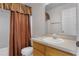 Bathroom featuring a shower-tub combo and classic finishes at 520 Farmingham Ct, Oviedo, FL 32765