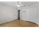 Bedroom featuring light wood floors and a double door closet at 520 Farmingham Ct, Oviedo, FL 32765