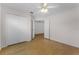 Bedroom featuring light wood floors and a double door closet at 520 Farmingham Ct, Oviedo, FL 32765