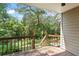 This home has a wooden back deck with a wooded view, perfect for relaxing or entertaining at 609 Northbridge Dr, Altamonte Springs, FL 32714