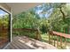 This home has a wooden back deck with a wooded view, perfect for relaxing or entertaining at 609 Northbridge Dr, Altamonte Springs, FL 32714