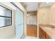Bathroom featuring a glass-enclosed shower and granite countertops at 609 Northbridge Dr, Altamonte Springs, FL 32714