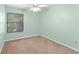 Bedroom featuring a ceiling fan and window at 609 Northbridge Dr, Altamonte Springs, FL 32714