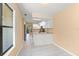 Open kitchen with breakfast area, tile floors, bright white cabinets and stainless steel appliances at 609 Northbridge Dr, Altamonte Springs, FL 32714
