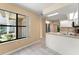 Well-lit kitchen with an open layout, featuring a breakfast bar, stainless steel appliances and tile flooring at 609 Northbridge Dr, Altamonte Springs, FL 32714
