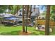 Large backyard featuring a deck, patio furniture, fire pit and plenty of space for outdoor enjoyment at 641 E Livingston St, Orlando, FL 32803
