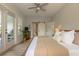 Comfortable bedroom with barn door access and ample natural light at 641 E Livingston St, Orlando, FL 32803