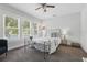 Bedroom featuring a bed, large windows, and neutral carpet at 641 E Livingston St, Orlando, FL 32803