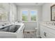 Convenient laundry room with modern washer, dryer, and storage at 641 E Livingston St, Orlando, FL 32803