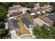 Aerial view of a home showcasing the backyard, landscaping, and surrounding neighborhood at 6856 Ebans Bend, Orlando, FL 32807