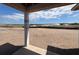 View from the covered porch shows a new home's spacious lot and future outdoor potential at 707 Junonia Blvd, New Smyrna Beach, FL 32168