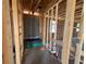 Bathroom framing with modern tub installation and exposed plumbing lines at 707 Junonia Blvd, New Smyrna Beach, FL 32168