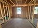 Bathroom framing with a window and pre-plumbing installed at 707 Junonia Blvd, New Smyrna Beach, FL 32168