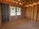 Bedroom framing featuring a bright window, and exposed ceiling beams at 707 Junonia Blvd, New Smyrna Beach, FL 32168