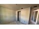 Unfinished bedroom showcasing ample space and potential for customization at 707 Junonia Blvd, New Smyrna Beach, FL 32168