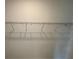 Walk-in closet with a wire shelf and rod system for storing clothes and organizing accessories at 707 Junonia Blvd, New Smyrna Beach, FL 32168