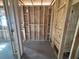 New construction shows the framed interior of a closet with visible structural elements at 707 Junonia Blvd, New Smyrna Beach, FL 32168