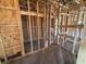 Framed interior view shows the layout of rooms in a new home construction project at 707 Junonia Blvd, New Smyrna Beach, FL 32168