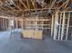 Interior view of the new construction shows the stud frame of the rooms ready for build out at 707 Junonia Blvd, New Smyrna Beach, FL 32168