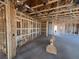 Interior view of the new construction shows the stud frame of the rooms ready for build out at 707 Junonia Blvd, New Smyrna Beach, FL 32168