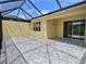 Screened-in lanai with a paver patio offering a relaxing outdoor living space at 726 Coral Reef Way, Daytona Beach, FL 32124
