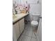 Functional bathroom with a vanity, toilet, and storage at 837 Pebble Creek Cir, Orlando, FL 32824