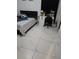 Relaxing bedroom with a bed, desk, and modern decor at 837 Pebble Creek Cir, Orlando, FL 32824