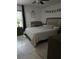Bright bedroom featuring a queen bed, window, and matching furniture at 837 Pebble Creek Cir, Orlando, FL 32824