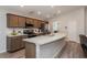 Modern kitchen featuring stainless steel appliances, ample counter space, and stylish cabinetry at 871 Orleans Dr, Eagle Lake, FL 33839