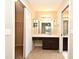 Bright and airy bathroom with double sinks and walk-in closet at 984 Dinero Dr, Winter Springs, FL 32708
