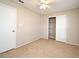 Neutral bedroom featuring carpet, closet, and a ceiling fan at 984 Dinero Dr, Winter Springs, FL 32708